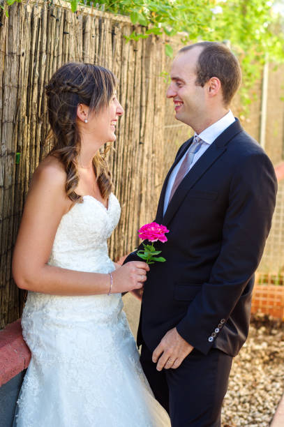 istock couple just married looking face to face smile 814442668