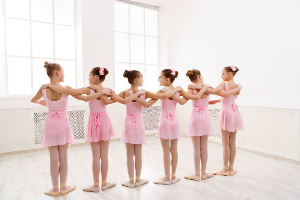 istock Little girls dancing ballet in studio 814447392