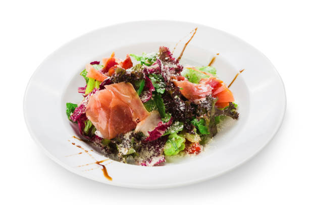 istock Restaurant food closeup - salad with prosciutto and vegetables 814453674