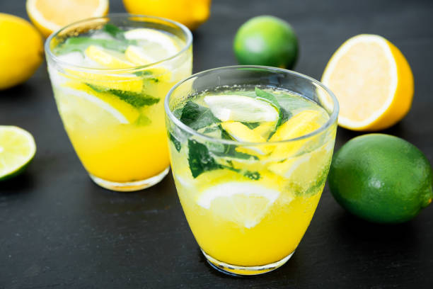 istock Fresh citrus cold lemonade with limes and lemons in glasses 814472564