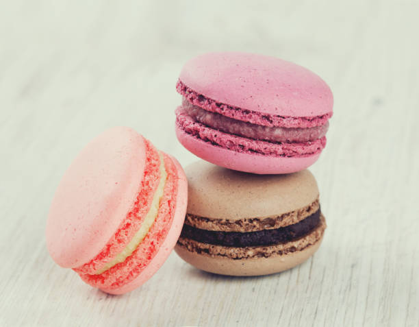 istock colorful macaroons on wooden surface 814491504