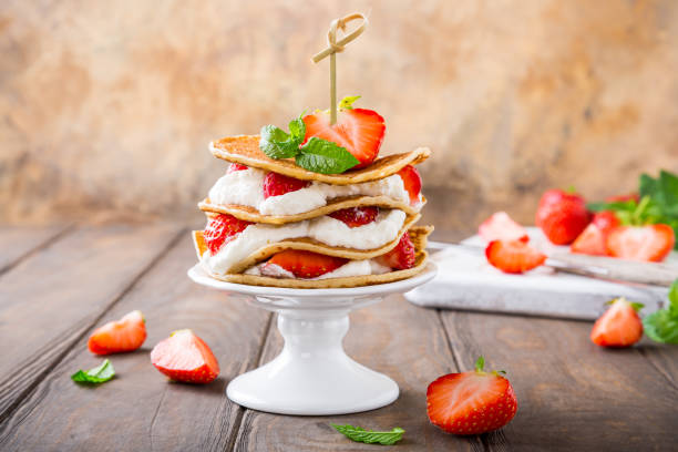istock Pancakes cake with yogurt and strawberries 814497082