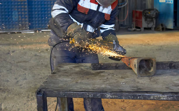 istock Metal grinding on steel spare part in workshop 814497084