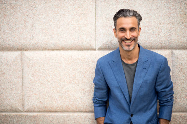 istock Portrait of handsome man looking at camera 814497100