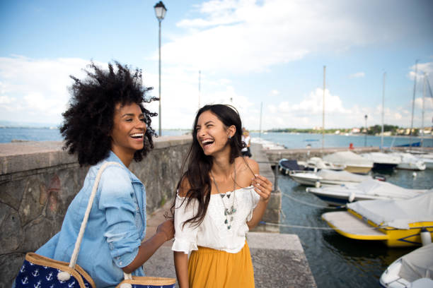 istock Two happy woman friends laughing 814512962
