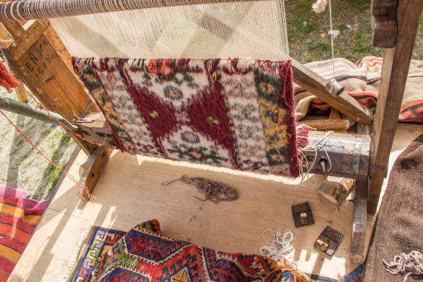 istock Carpet of  traditional types on a loom 814519780
