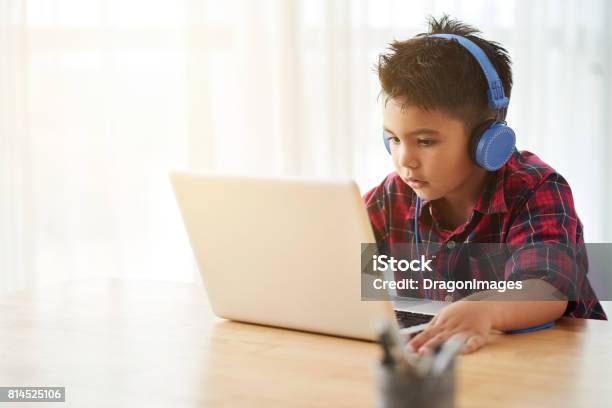 Watching Cartoons Stock Photo - Download Image Now - Child, Boys, Digital Tablet