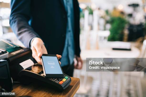 Mobile Payment Stock Photo - Download Image Now - Paying, Mobile Payment, Contactless Payment