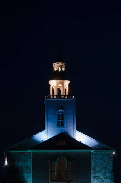 istock Illuminated Church Steeple at Night 814567282
