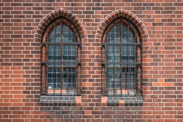 istock two old windows  , gothic  church building exterior 814568370