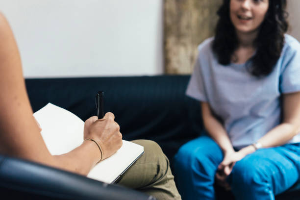 istock Woman during a psychotherapy session 814596228