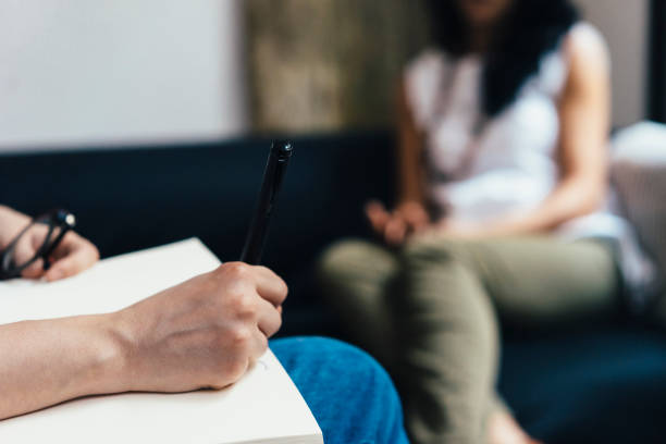 istock Woman during a psychotherapy session 814596230