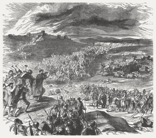 Victory over the Midianites (Numbers 31), wood engraving, published 1886 The victory of Israel over the Midianites (Numbers 31). Wood engraving, published in 1886. moses religious figure stock illustrations