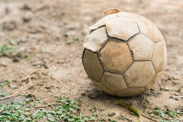 old football on old soccer field