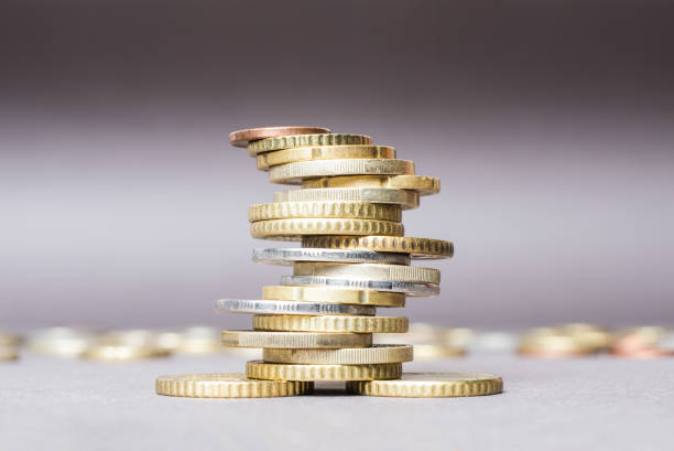 istock Coins stacked on each other in different positions. Money concept. 814622530