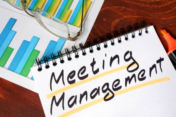 istock Notepad with Meeting Management on a wooden surface. 814629630