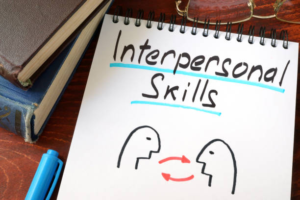 Interpersonal Skills written in a paper with a glasses.