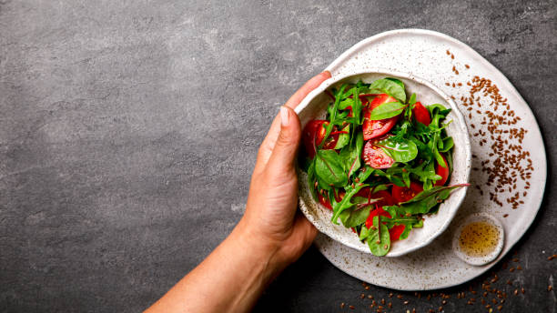 istock Salad with baby Spinach, arugula and Fresh Cherry Tomatoes 814629986