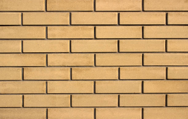 istock Orange brick wall with a small distance 814644738