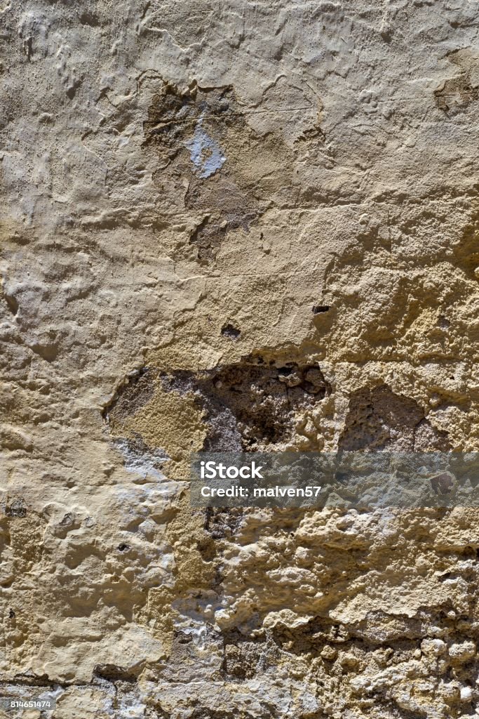old texture of an ancient stone wall old rough texture of a stone wall and ruins for a background and for wallpaper Greece Stock Photo