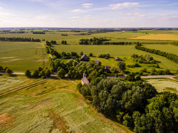 istock drone image. aerial view of rural area with fields and forests 814660832