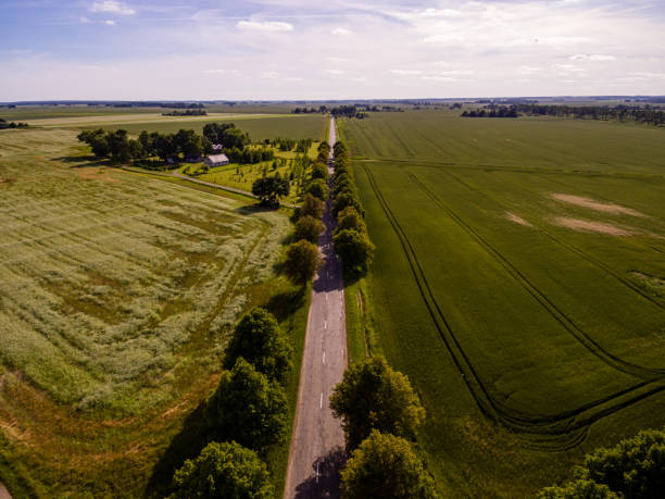 istock drone image. aerial view of rural area with fields and forests 814660834