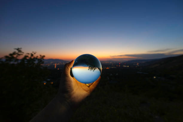 Magic glass ball being tossed up