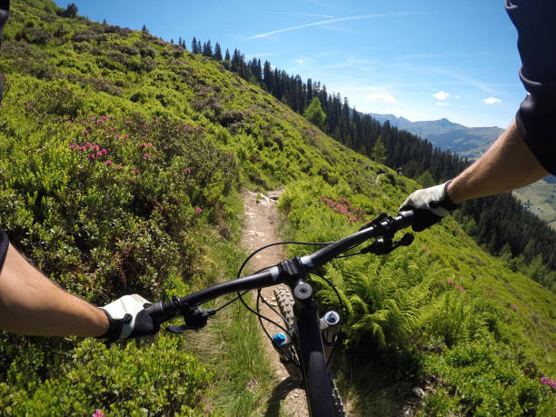 istock Navigating narrow bike trail in Austrian Alps 814663968