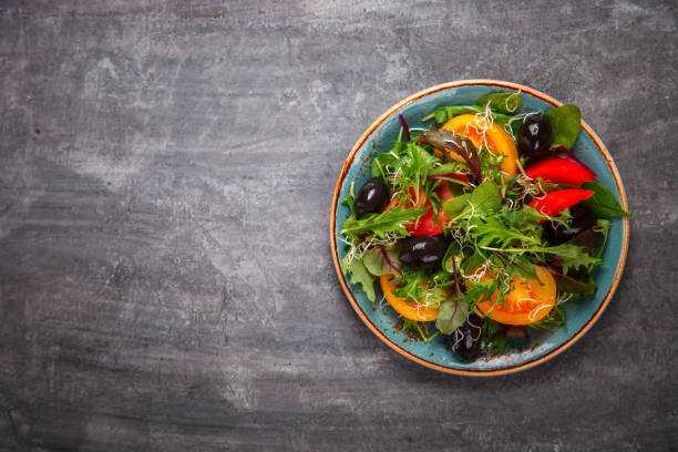 istock Fresh Green mix Salad with Vegetables, Tomatoes and Microgreen 814677108