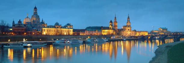 istock Night panorama of Dresden Old town with reflections in Elbe river 814680894