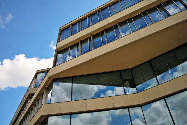 istock Modern building.Modern office building with facade of glass 814700358