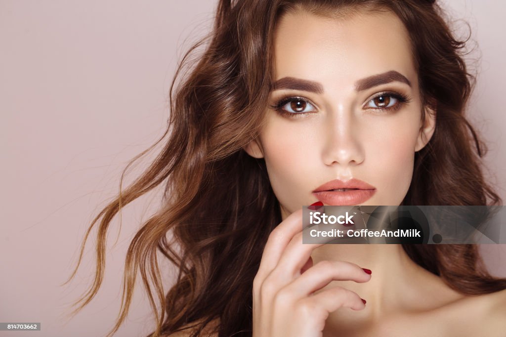 Studio shot of young beautiful woman Human Lips Stock Photo