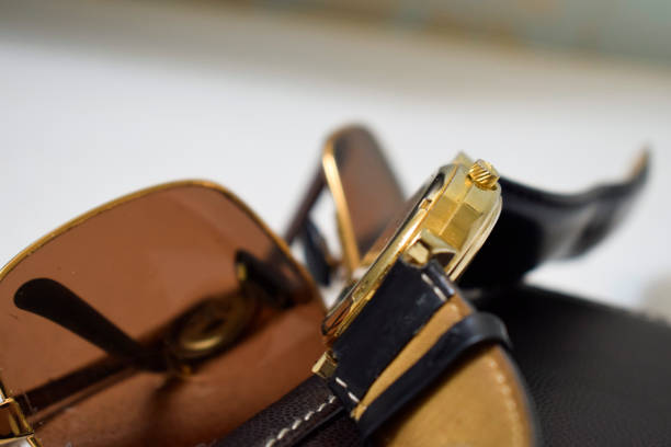 istock Antique hand watch and sunglasses 814709390