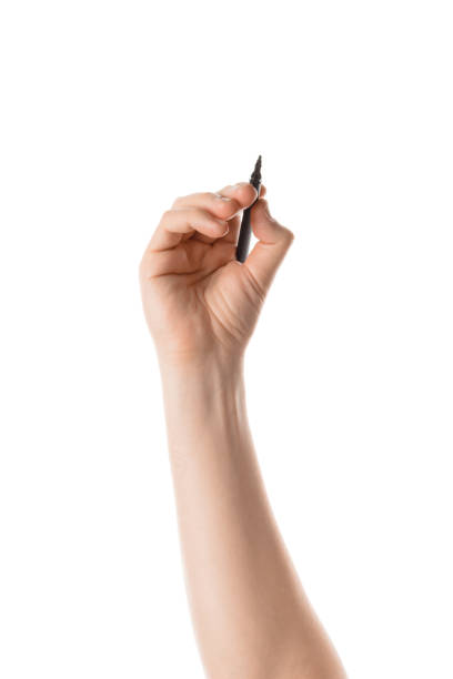 istock Male hand writing with the marker or felt pen. Isolated on white 814719326