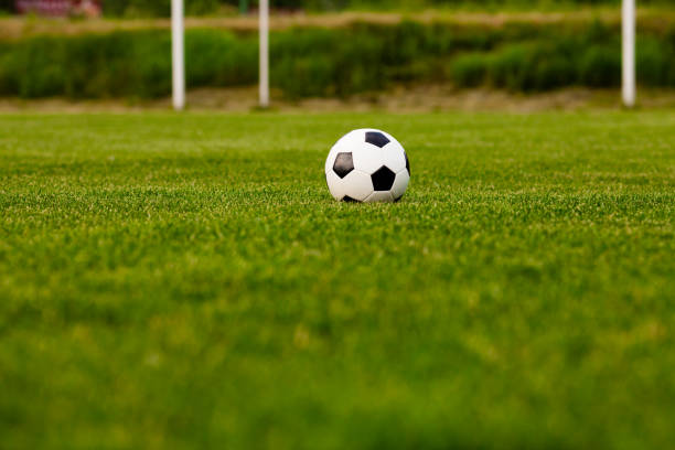 Soccer ball on the grass before the game