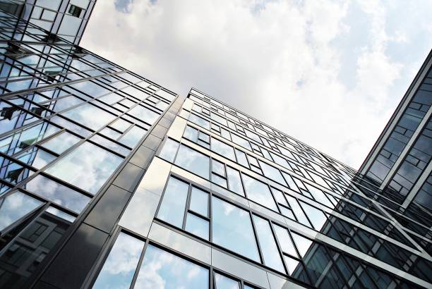 istock Modern building.Modern office building with facade of glass 814725328