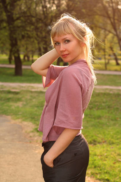 istock Girl in town park 814731186