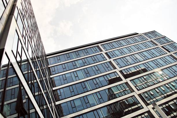 istock Modern building.Modern office building with facade of glass 814734948