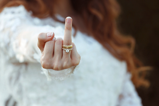 Bride showing ring finger