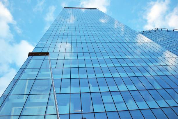 istock Modern building.Modern office building with facade of glass 814761636