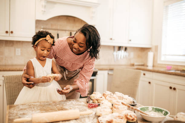 istock Mom and toddler baking together 814763760
