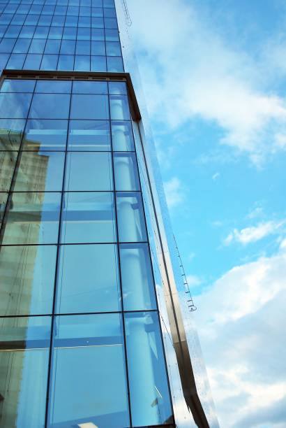 istock Modern building.Modern office building with facade of glass 814763776