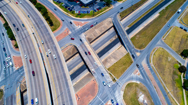 istock Angles and Patterns Austin , TX Interstate and Highway Intersections and Crossroads near Urban Sprawl Dense transportation Overpass travel System 814771838