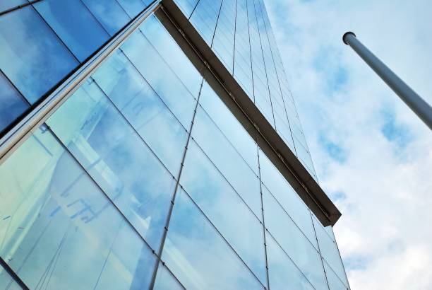 istock Modern building.Modern office building with facade of glass 814771856