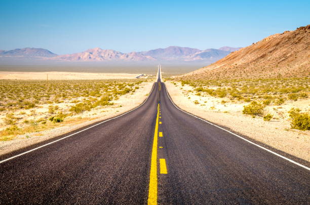 istock Never ending road to Death Valley, California 814774602