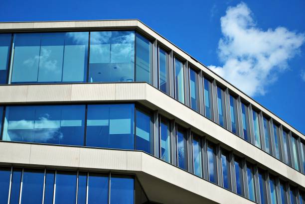 istock Modern building.Modern office building with facade of glass 814775490