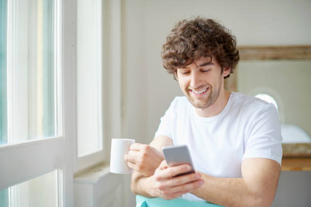 istock Starting the day with coffee and reading messages 814788284
