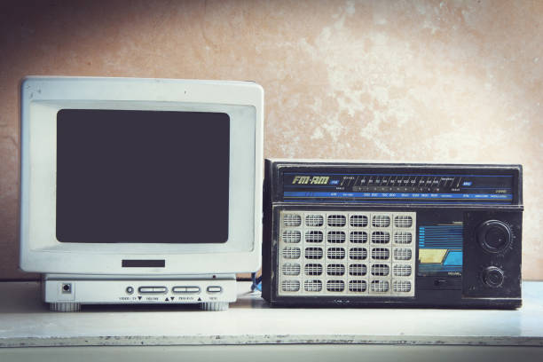 istock oldie things. radios, tvs on wooden floor 814790898