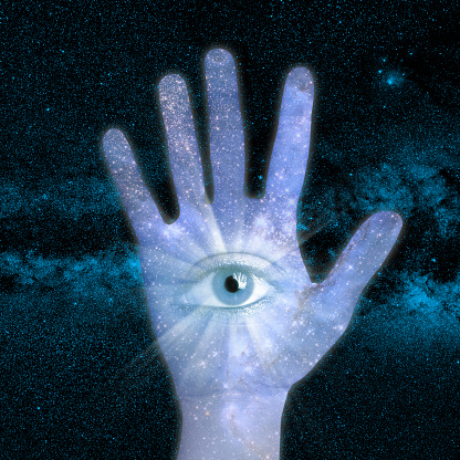 conceptual image of hand and abstract lights of universe. NASA galaxy images manipulated and used; https://nasasearch.nasa.gov/search/images?utf8=%E2%9C%93&affiliate=nasa&query=galaxy+images