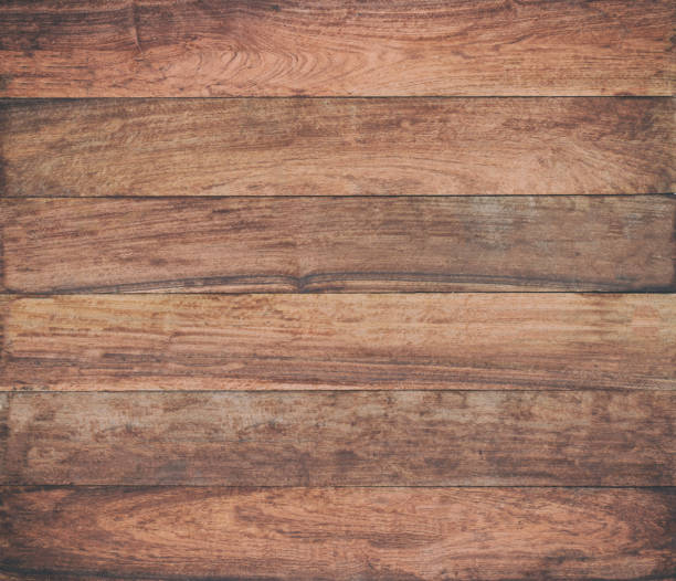 istock Vintage surface wood table and rustic grain texture background. Close up of dark rustic wall made of old wood table planks texture. Rustic brown wood table texture background template for your design. 814802090